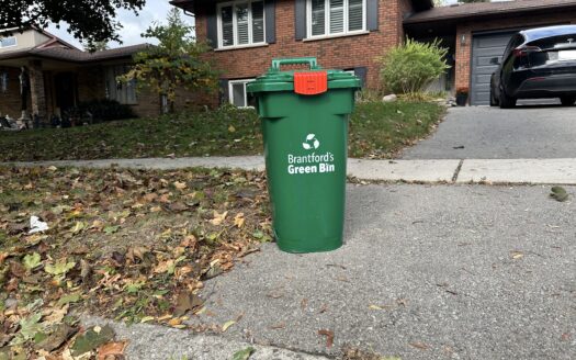 a new green bin delivered to the driveway of a Brantford Resident from the New Green Bin Program in Brantford